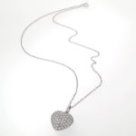 carp link chain featuring a stunning heart shaped diamond simulant studded pendant