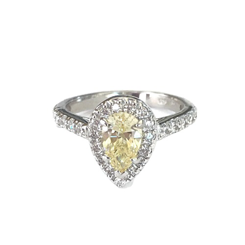 Ring 1.38ct (8x5mm) Diamonds Simulant Pear shape (teardrop)-YELLOW COLOR, prong set, surrounded by small brilliant simulants 1.5mm, and 1.75 mm on a half band prong set.Silver 925 with white gold plating.