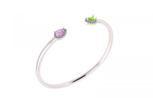 Pear-Shape Halo Cuff Open.   Crafted in sterling silver with rhodium plating, this clever design features two striking pear shaped halo settings at both ends of bypass.  Easy and elegant, this flexible bangle bracelet is a great anytime look.