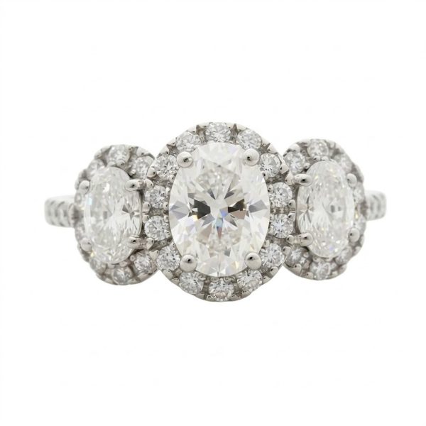 THREE-STONE HALO RING