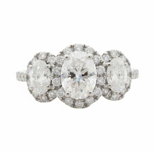 THREE-STONE HALO RING