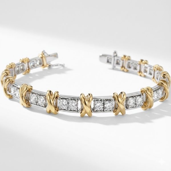 Sterling silver diamond bracelet with round-cut stones and 14k yellow gold plated X-shaped accents.